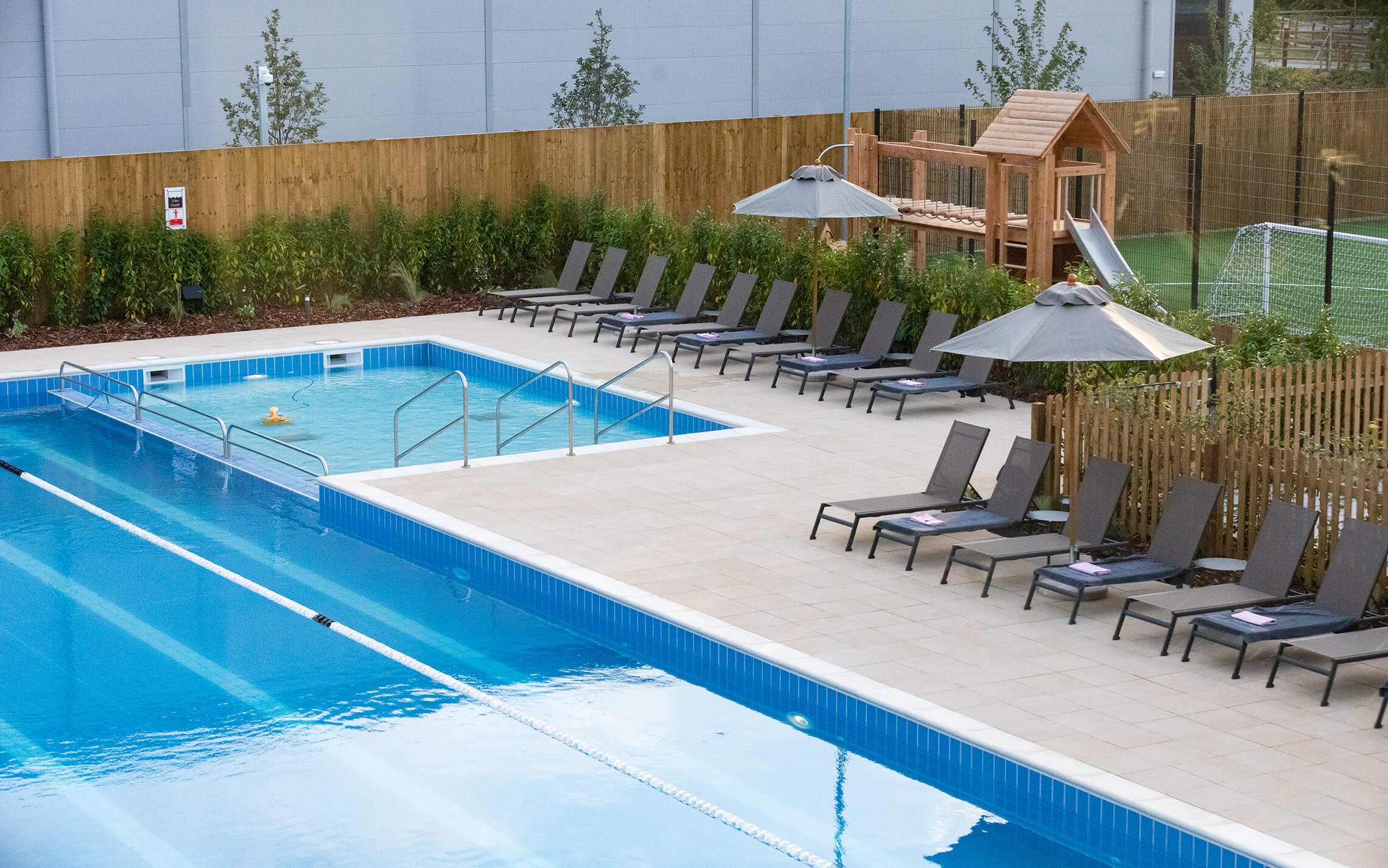Outdoor Pool and Surrounding Amenities 